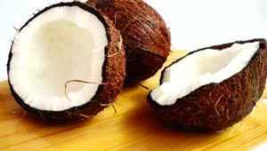 Stock Video Pair Of Coconuts Being Wet By Coconut Water Live Wallpaper