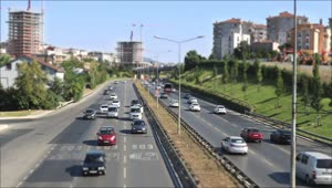 Stock Video Pair Of Highways Adjoining A City On A Sunny Day Live Wallpaper