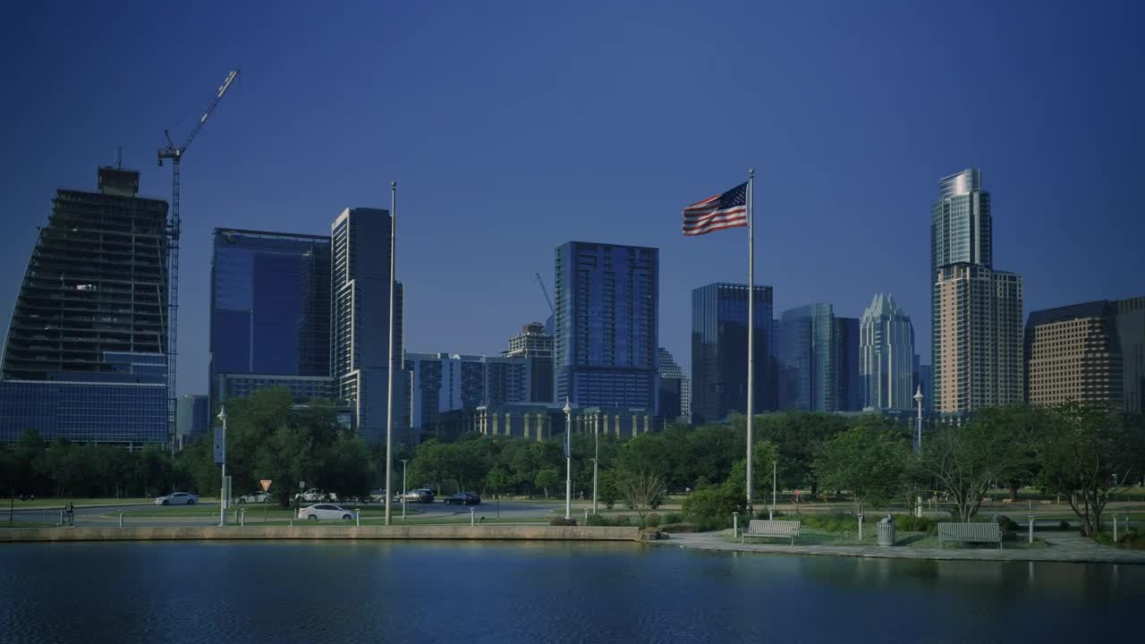 Download Stock Video Panorama Of A City From A Nearby Lake Live Wallpaper