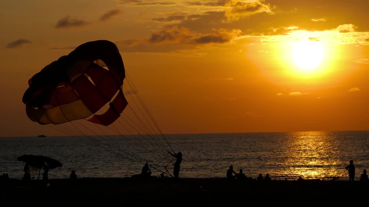 Download Stock Video Parachute And Sunset At The Beach Live Wallpaper