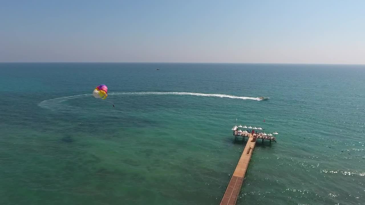 Download Stock Video Parachuting In The Tropical Sea Live Wallpaper