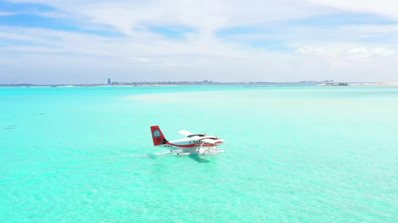 Download Stock Video Paradise Beach With A Water Plane Live Wallpaper