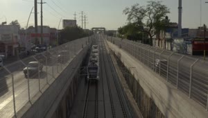 Stock Video Passenger Train Traveling Between The Streets Of A City Live Wallpaper