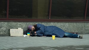 Download Stock Video Passerby Giving Money To Homeless Live Wallpaper