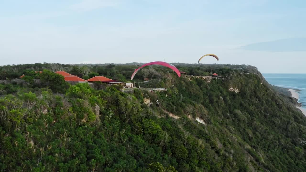 Download Stock Video People Practicing Parachuting Aerial Shot Live Wallpaper