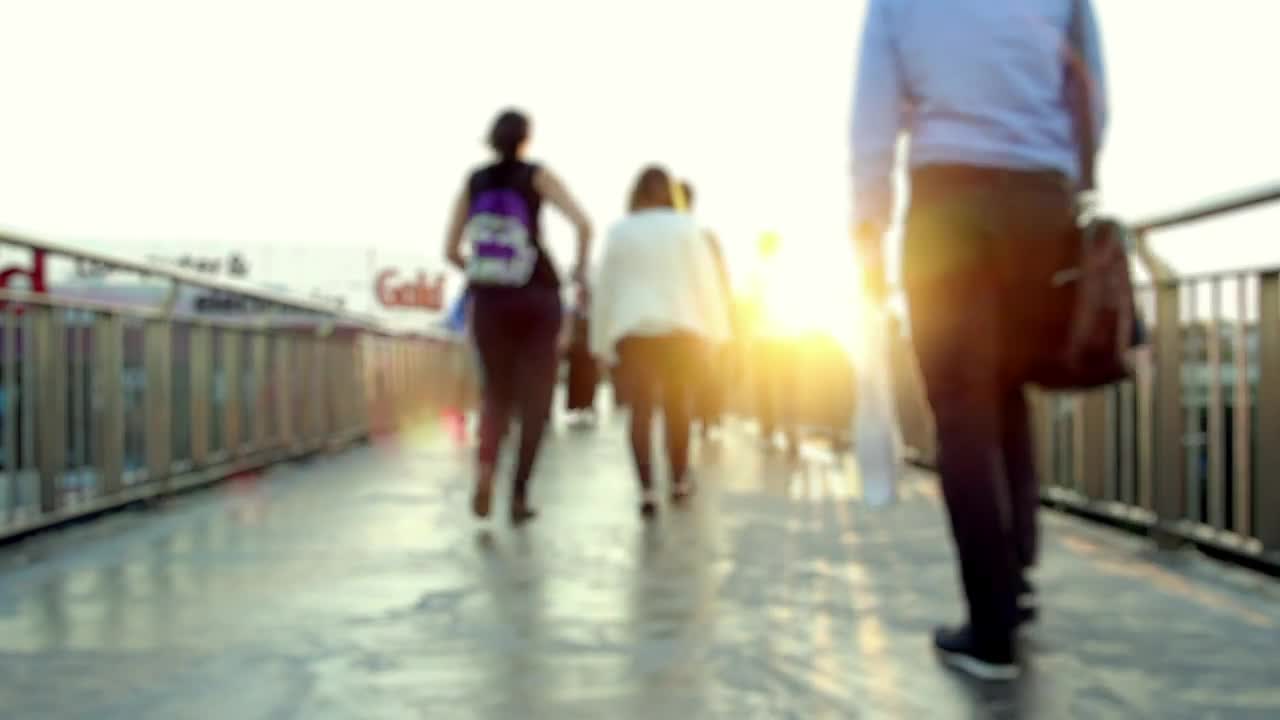 Download Stock Video People Walking Along A Crosswalk During Sunset Live Wallpaper