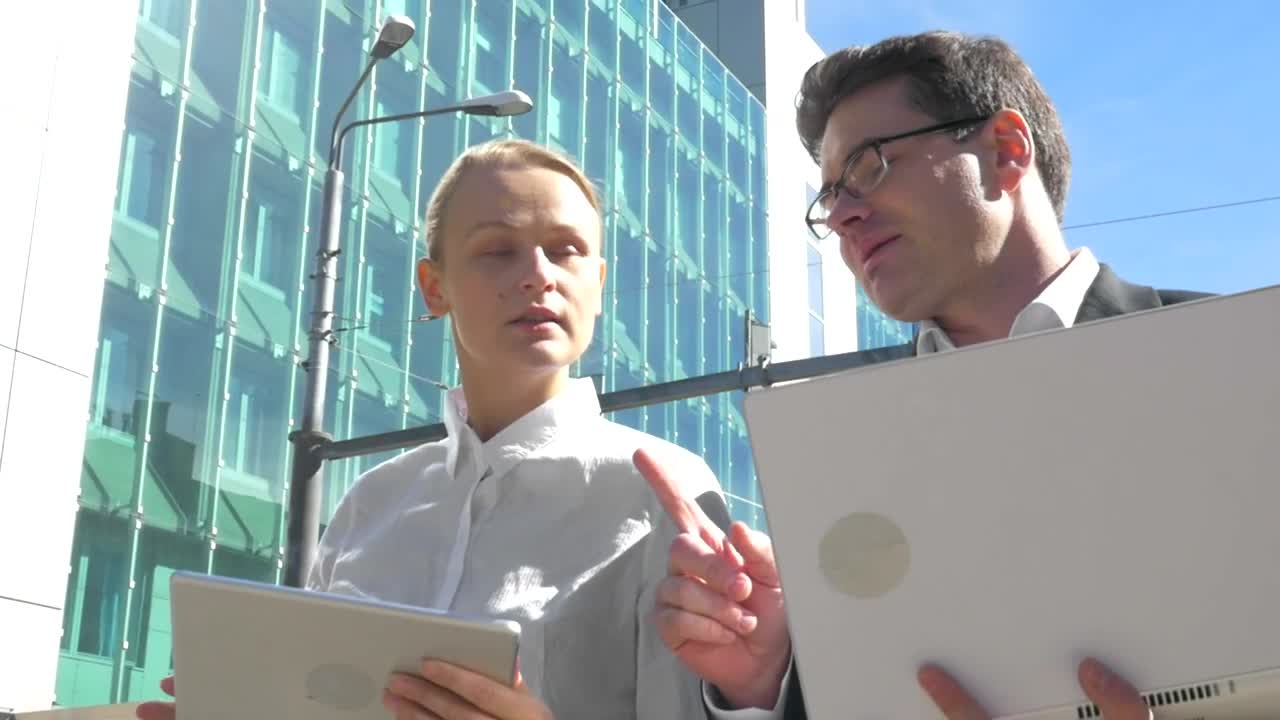 Download Stock Video People Walking With A Laptop And Tablet Live Wallpaper