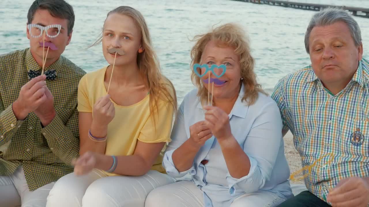 Download Stock Video People Wearing Novelty Glasses Live Wallpaper