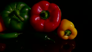 Stock Video Peppers Against A Dark Table Live Wallpaper