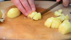 Stock Video Person Cutting Cubes Potatoes Live Wallpaper