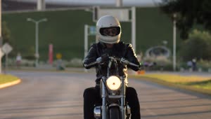 Stock Video Person Driving A Motorcycle On A Lonely Street Live Wallpaper