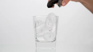 Stock Video Person Fills A Glass With Cola On White Background Live Wallpaper