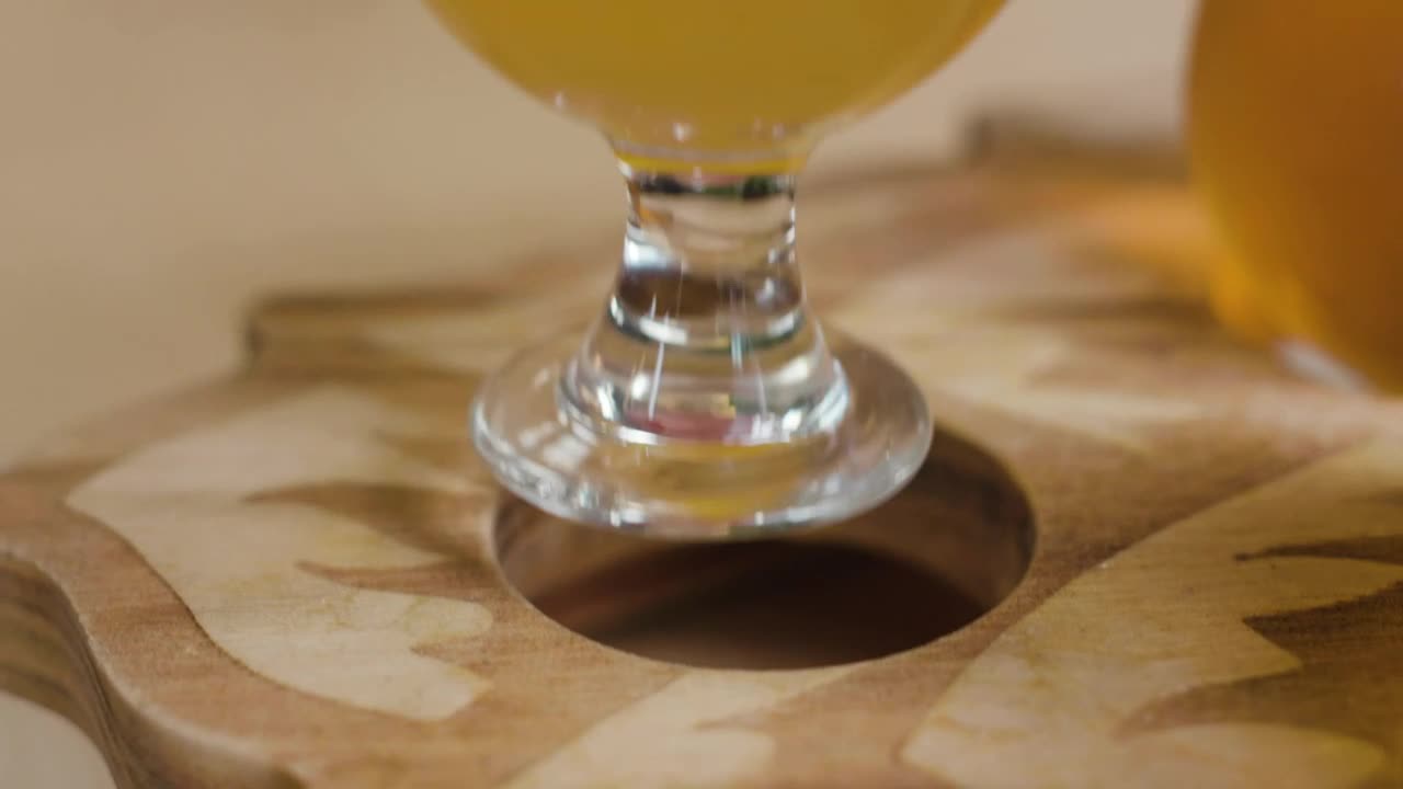 Download Stock Video Person Leaving A Beer Cup On A Wooden Board Live Wallpaper