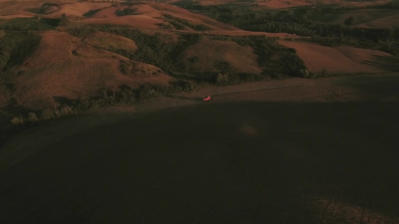 Download Video Stock Red Tractor Working A Field Live Wallpaper Free