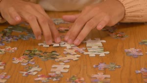 Video Stock Person Putting Together A Big Puzzle Live Wallpaper Free