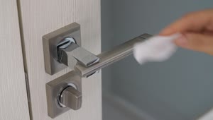 Video Stock Person Sanitizing A Doorknob Live Wallpaper Free