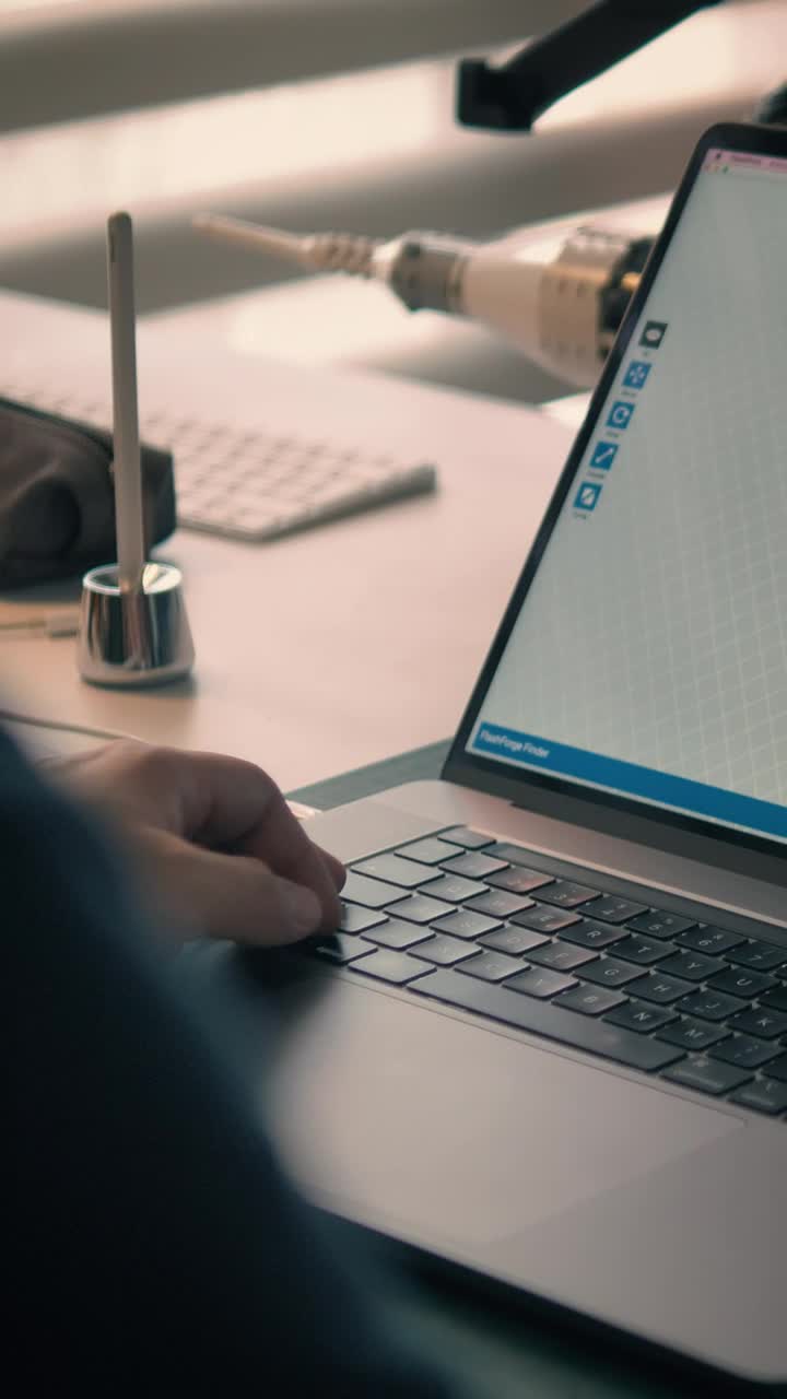 Download Video Stock Person Working On A D Model In His Workshop Live Wallpaper Free