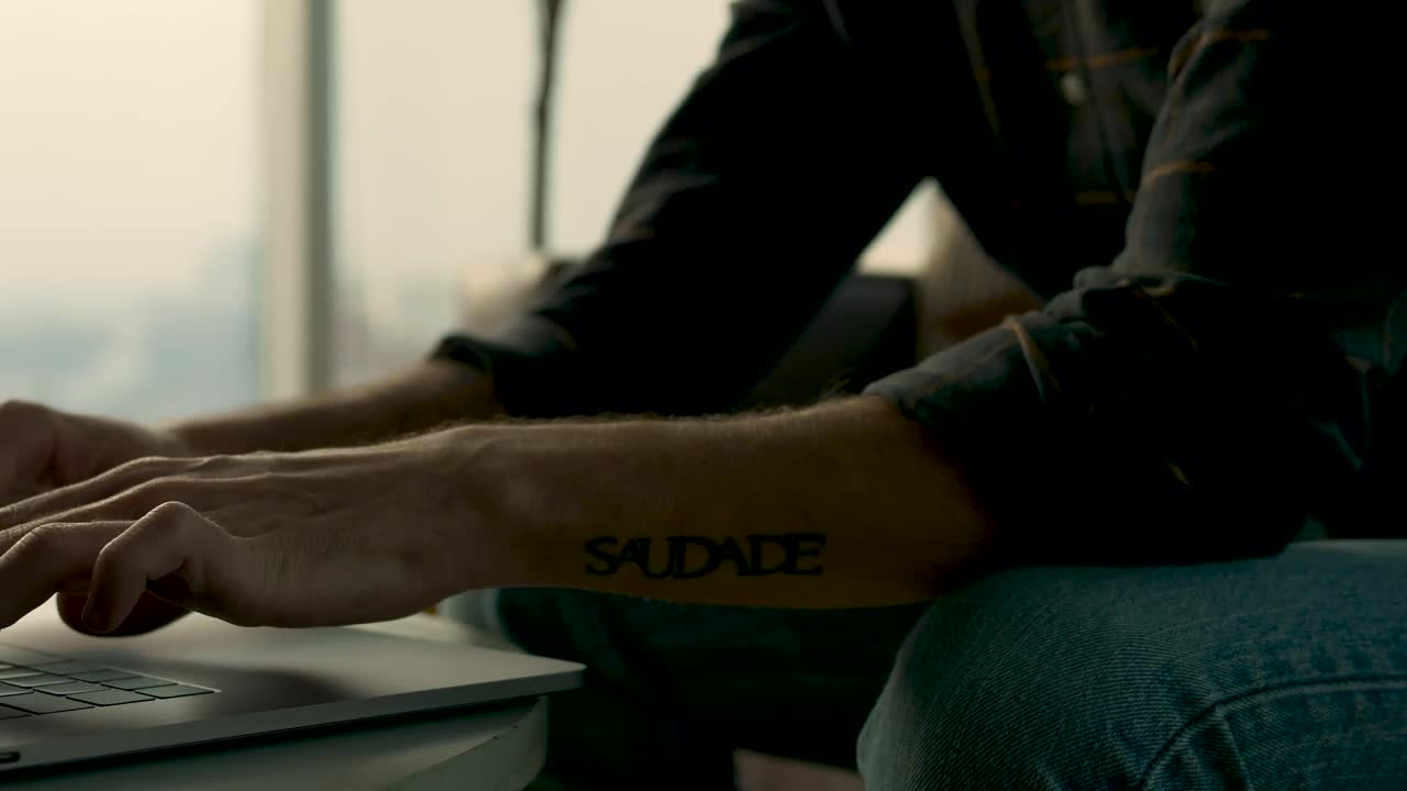 Download Video Stock Person Writing On A Laptop At Living Room Live Wallpaper Free