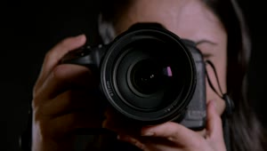 Video Stock Photographer Using A Digital Camera Live Wallpaper Free