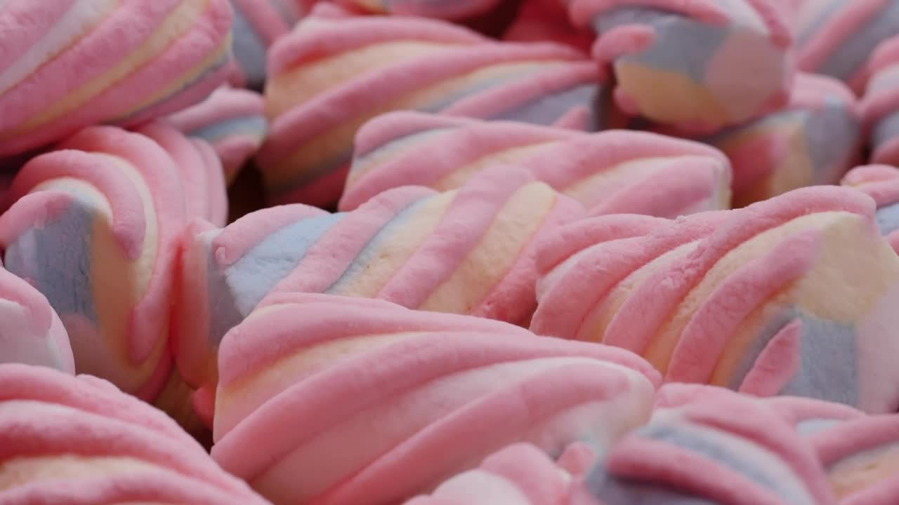 Download Video Stock Piled Up Chocolates Seen Up Close Live Wallpaper Free