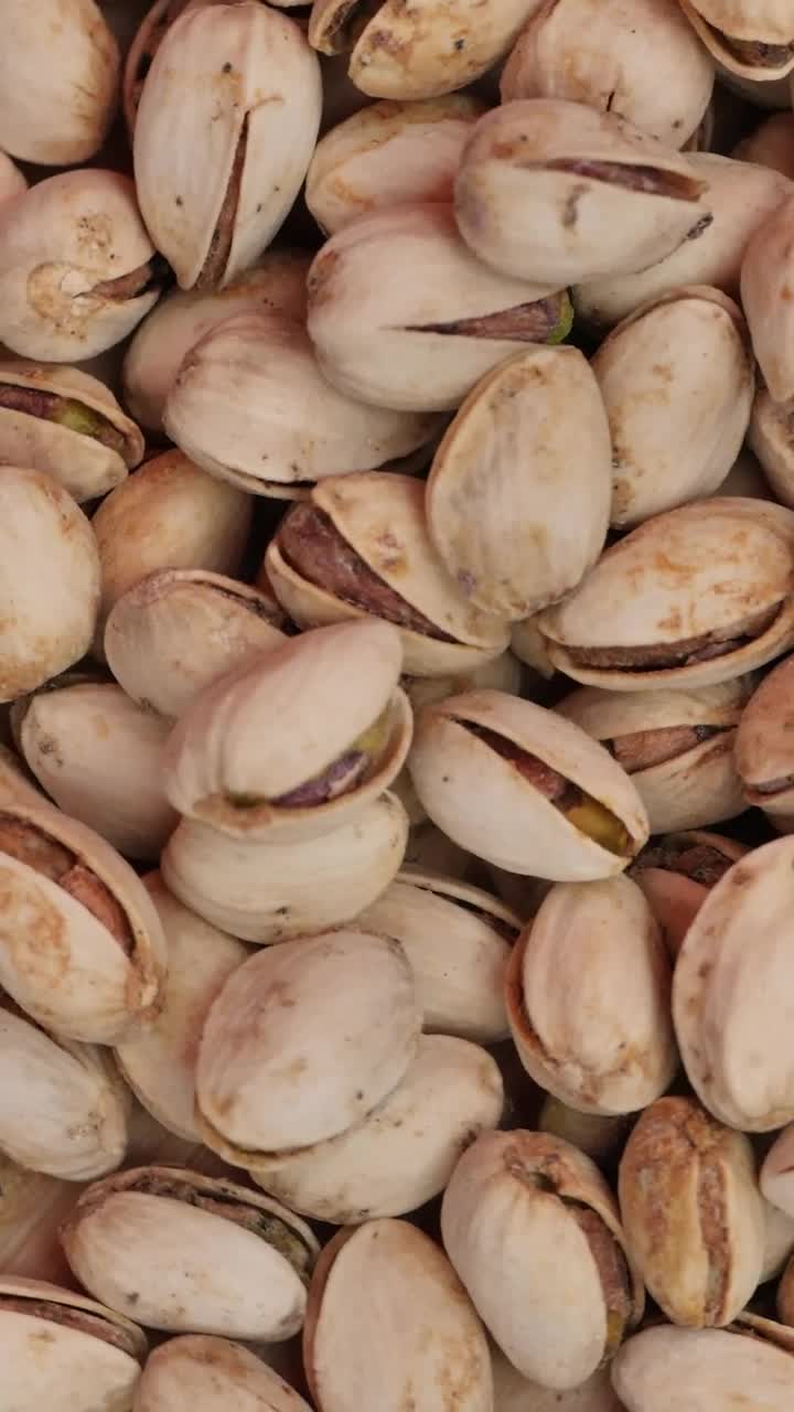 Download Video Stock Piled Up Pistachios Spinning Seen Up Close Live Wallpaper Free