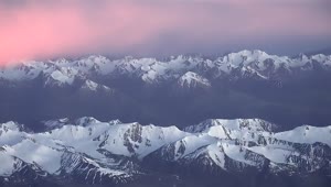 Video Stock Pink Clouds Over A Snowy Mountain Range Live Wallpaper Free