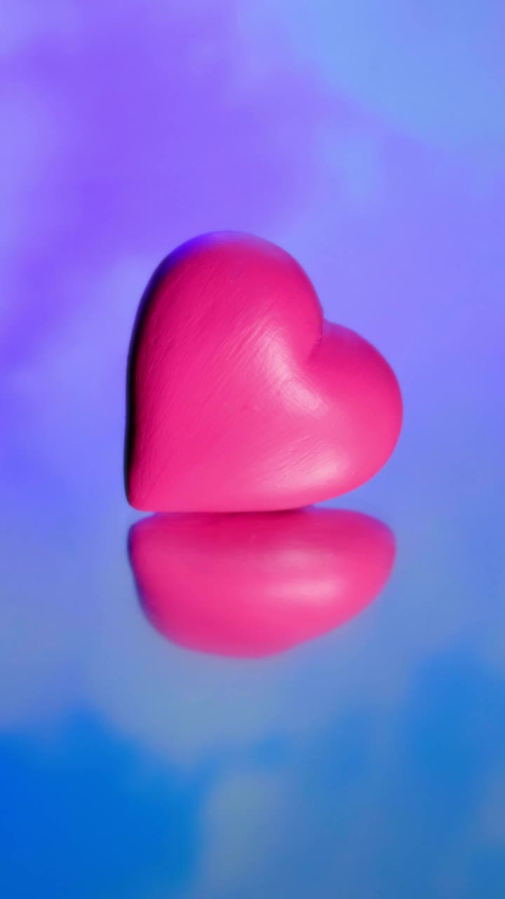 Download Video Stock Pink Heart On A Mirror With The Sky And Clouds Live Wallpaper Free