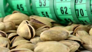 Video Stock Pistachios And A Tape Measure Spinning Close Up Live Wallpaper Free