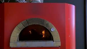 Video Stock Placing A Pizza In A Red Oven Live Wallpaper Free