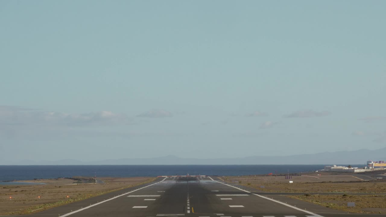 Download Video Stock Plane Landing At A Coastal Airport Live Wallpaper Free