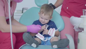 Video Stock Playful Boy In Consultation With The Dentist Live Wallpaper Free
