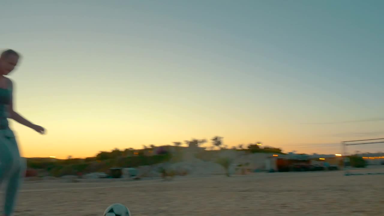 Download Video Stock Playing A Ball Game At The Beach Live Wallpaper Free