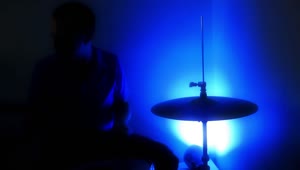 Video Stock Playing Drums In The Dark With A Lamp Colors Live Wallpaper Free