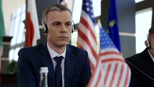 Video Stock Politician Listening To Translation Headphones Live Wallpaper Free