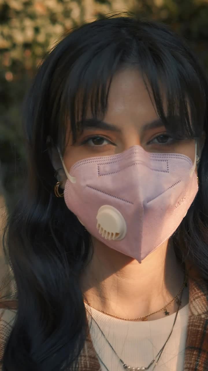 Download Video Stock Portrait Of A Girl With A Face Mask Live Wallpaper Free