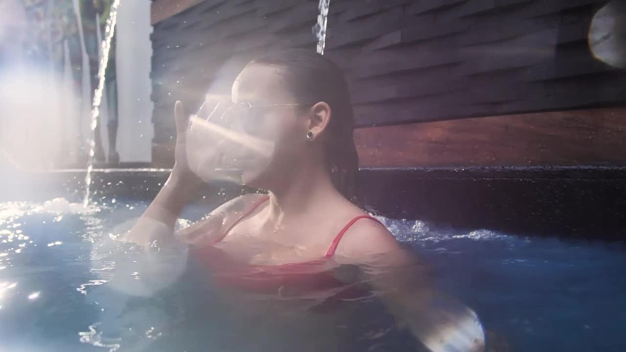Download Video Stock Portrait Of A Young Woman In Swimming Pool Live Wallpaper Free