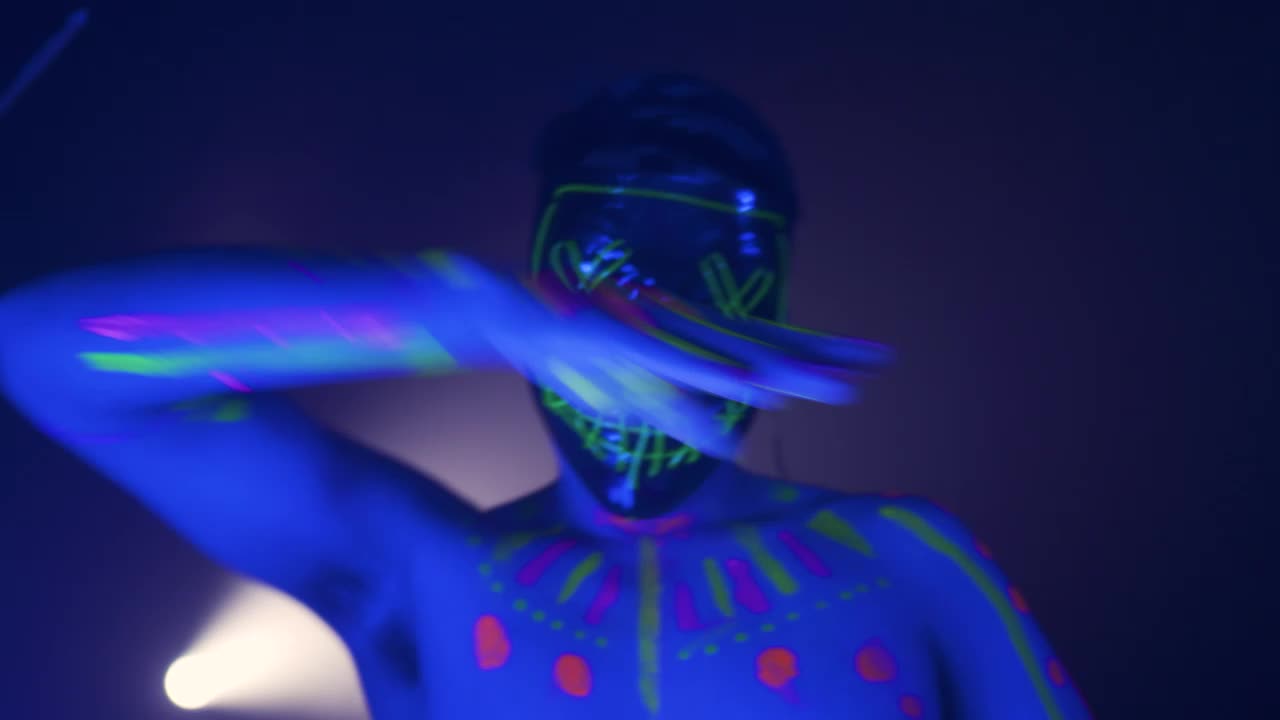 Download Video Stock Portrait Of An Urban Dancer Wearing A Neon Mask Dancing Live Wallpaper Free