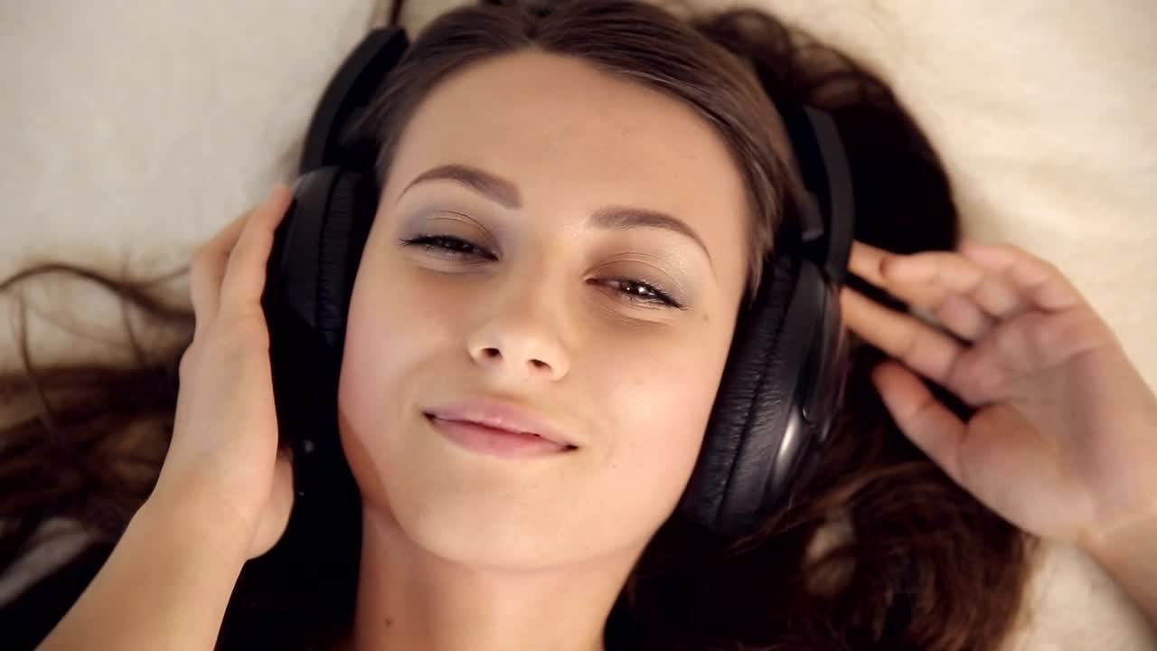 Download Video Stock Portrait Of Woman Enjoying While Listening To Music Live Wallpaper Free