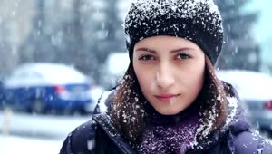 Video Stock Portrait Of Woman Outdoors While Snowing Live Wallpaper Free