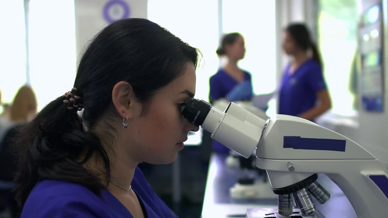 Download Video Stock Portrait Of Woman Working In A Laboratory Live Wallpaper Free