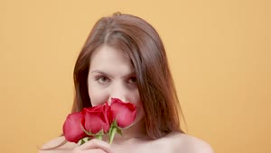 Video Stock Portrait Of Young Woman Smelling Red Roses Live Wallpaper Free