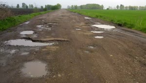 Video Stock Potholes In A Rural Road Live Wallpaper Free