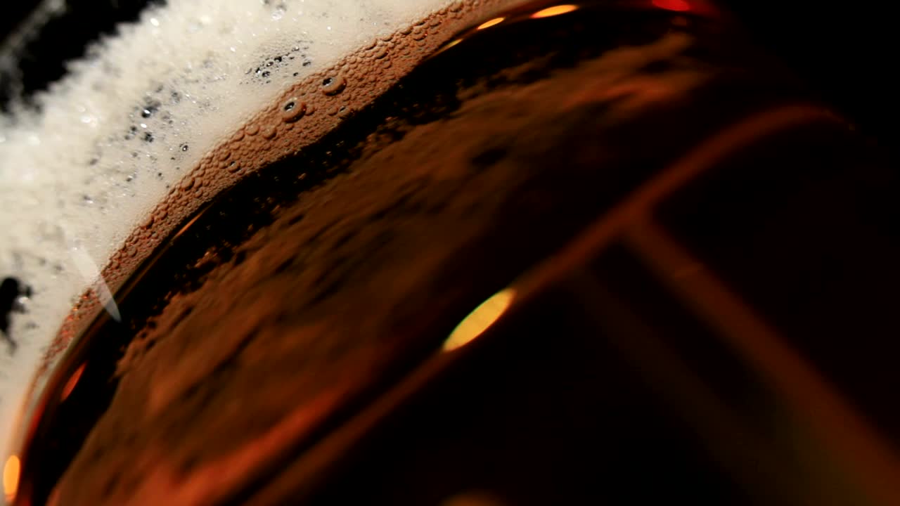Download Video Stock Pouring Beer Into A Tall Glass Live Wallpaper Free