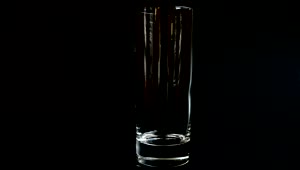 Video Stock Pouring Ice And Lemonade Into A Glass On Black Background Live Wallpaper Free