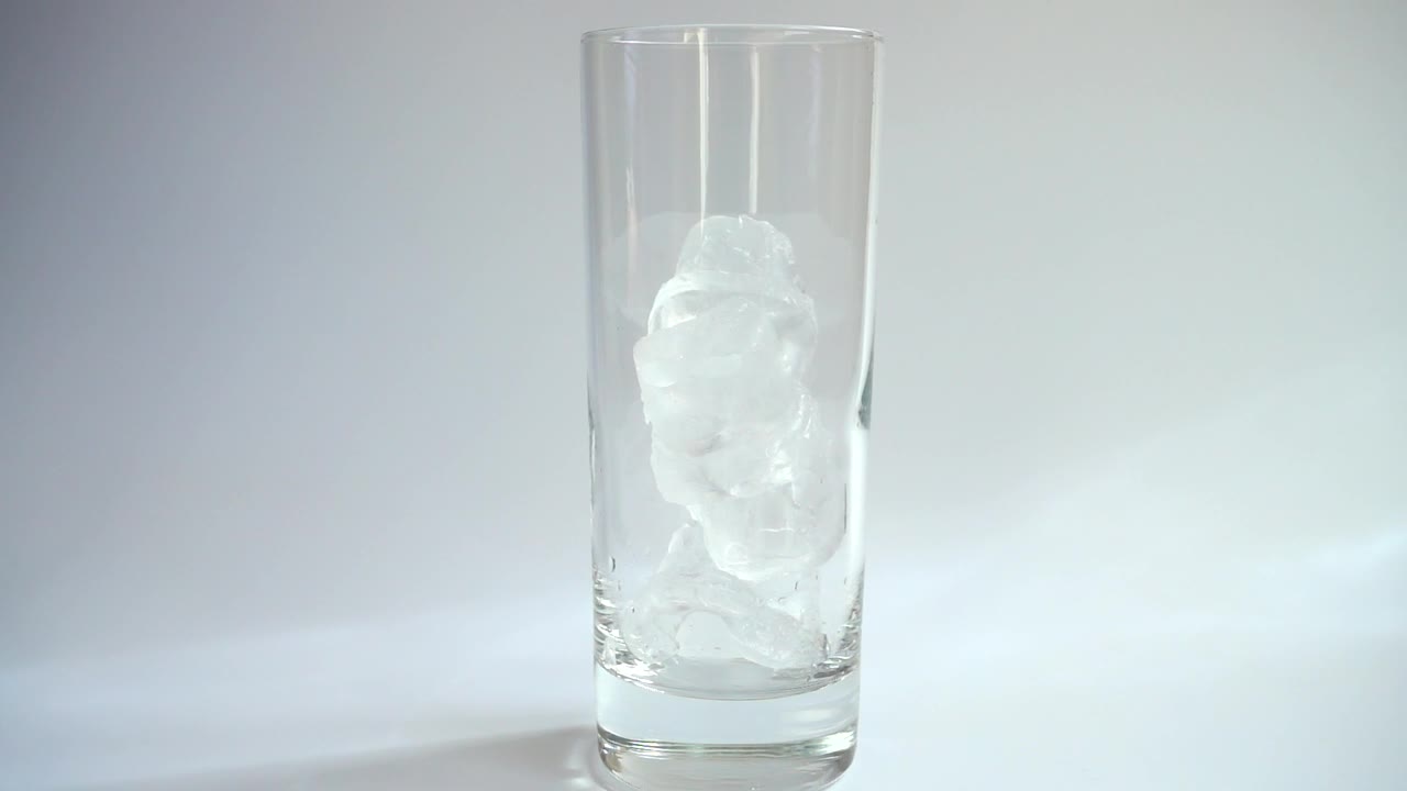 Download Video Stock Pouring Milk Into A Glass With Ice On A White Live Wallpaper Free