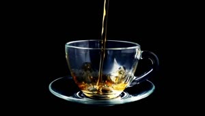 Video Stock Pouring Tea Into A Glass Cup Live Wallpaper Free