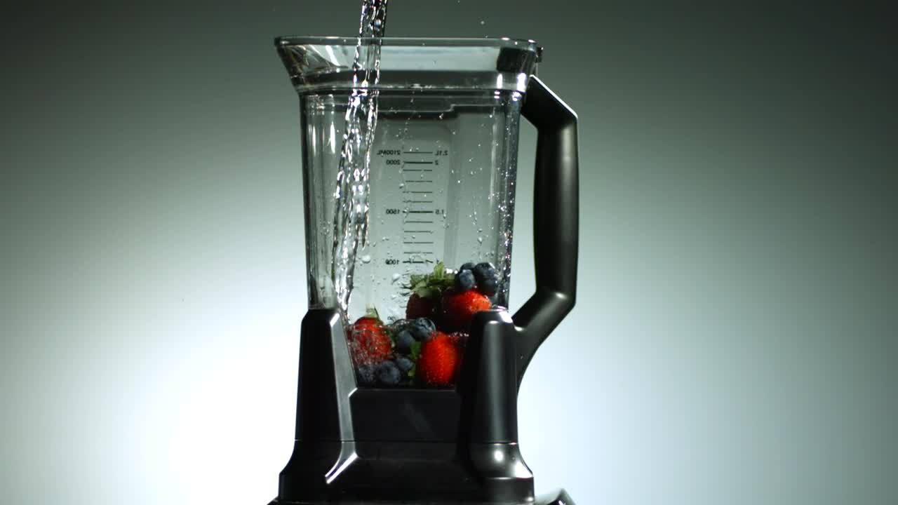 Download Video Stock Pouring Water Into Blender With Fruit Live Wallpaper Free