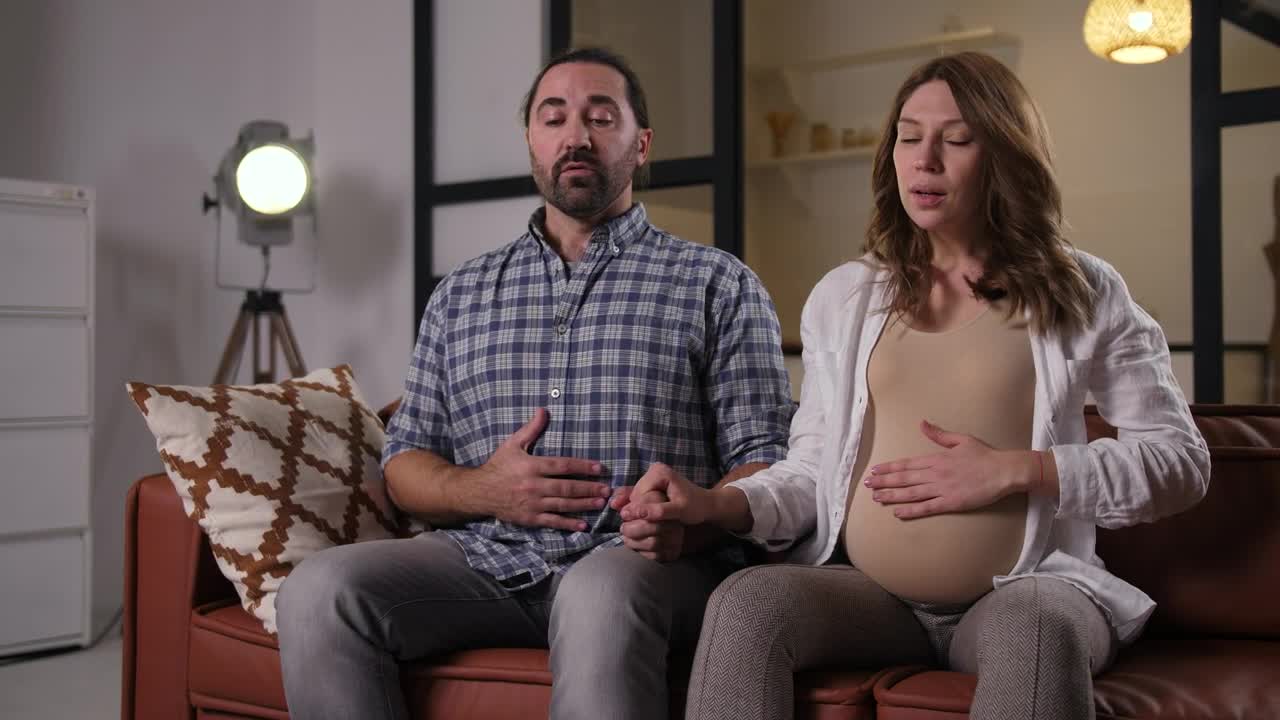 Download Video Stock Pregnant Woman Doing Breathing Exercises Live Wallpaper Free