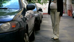 Video Stock Pregnant Woman Getting Into A Car Live Wallpaper Free