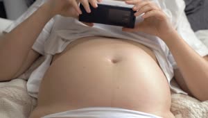 Video Stock Pregnant Woman Taking A Photo Live Wallpaper Free